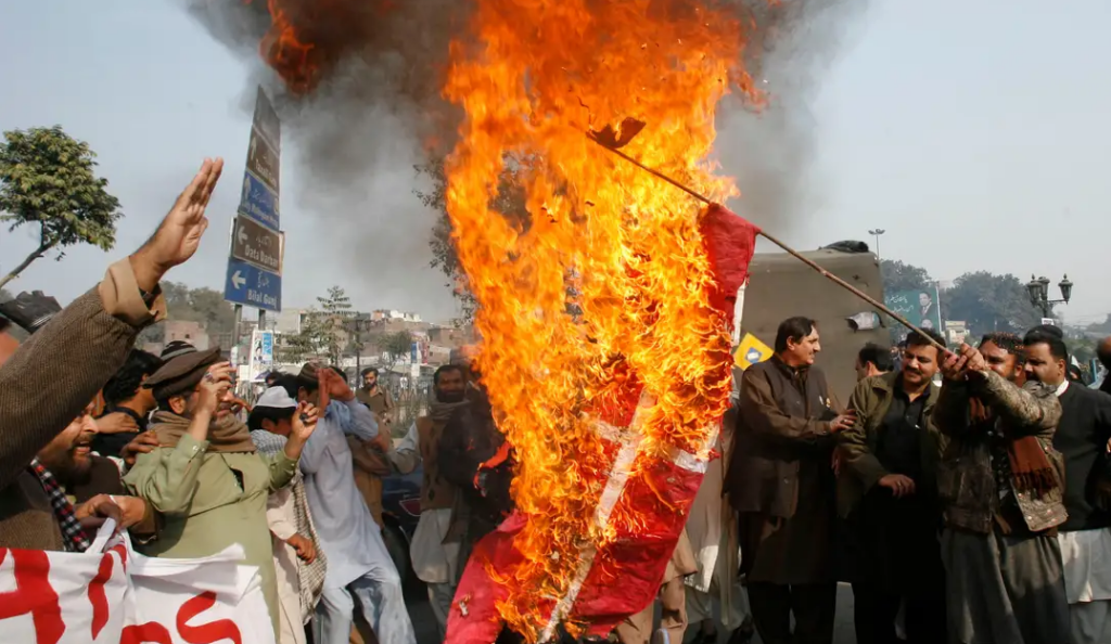 When Jyllandsposten published cartoons of the prophet Muhammad, a global free speech debate arised. Here are protesters burning the Danish flag in Pakistan.